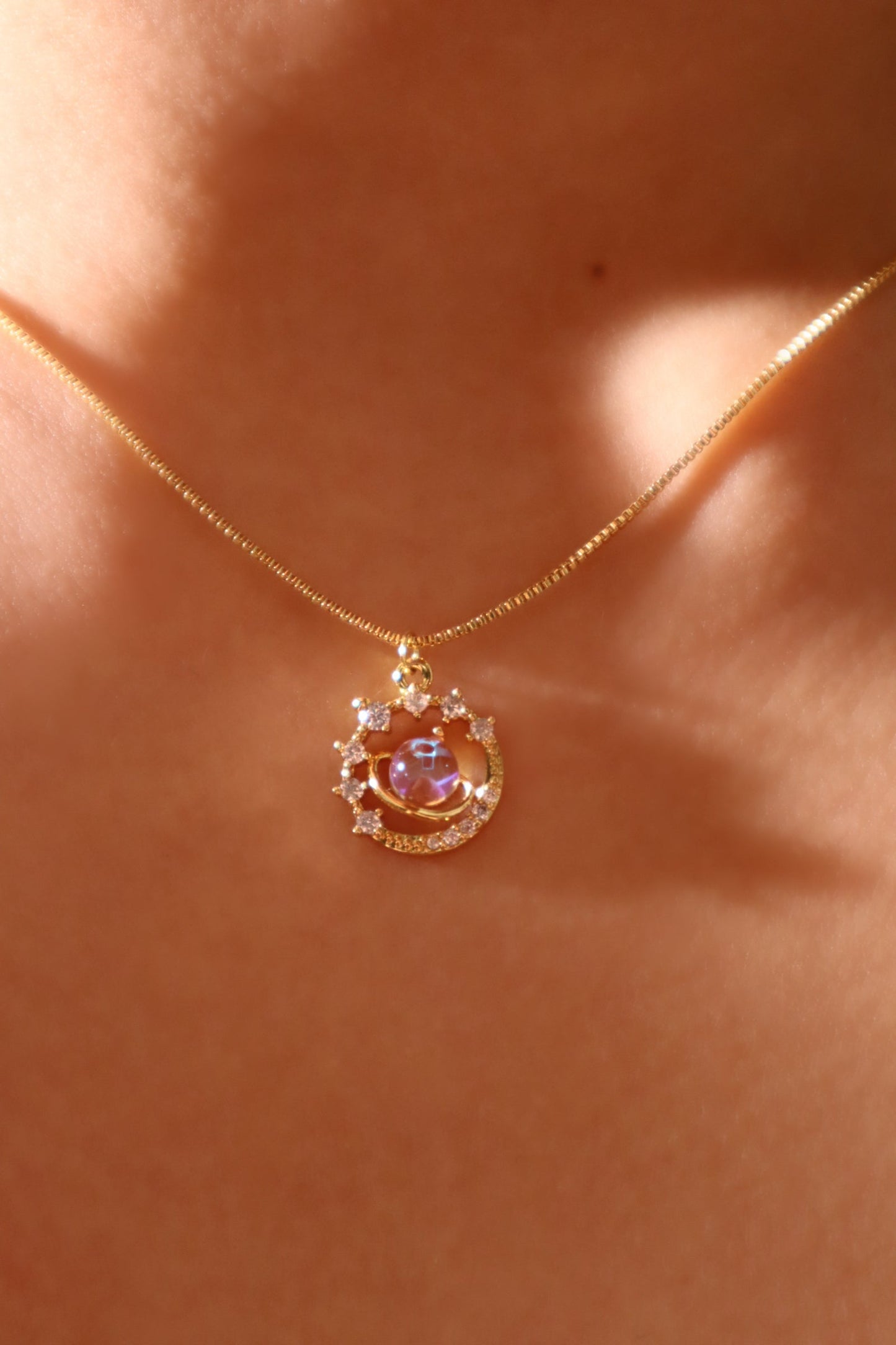 Ring met Saturnus en de Maan