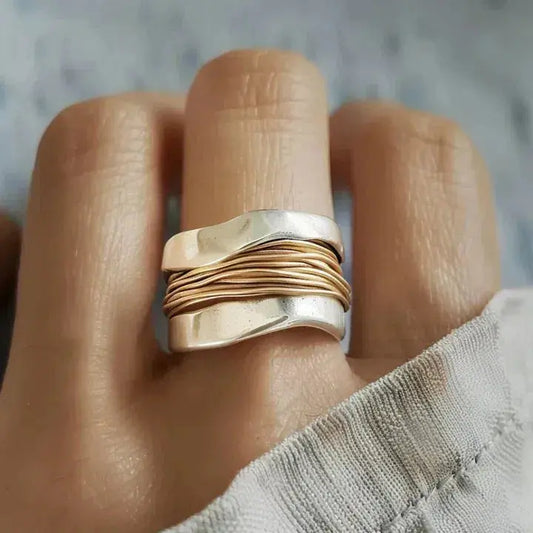 Zilveren ring met goudkleurige vlammen