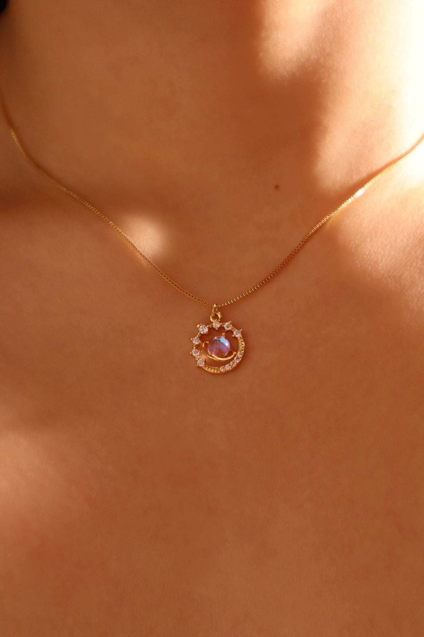 Ring met Saturnus en de Maan