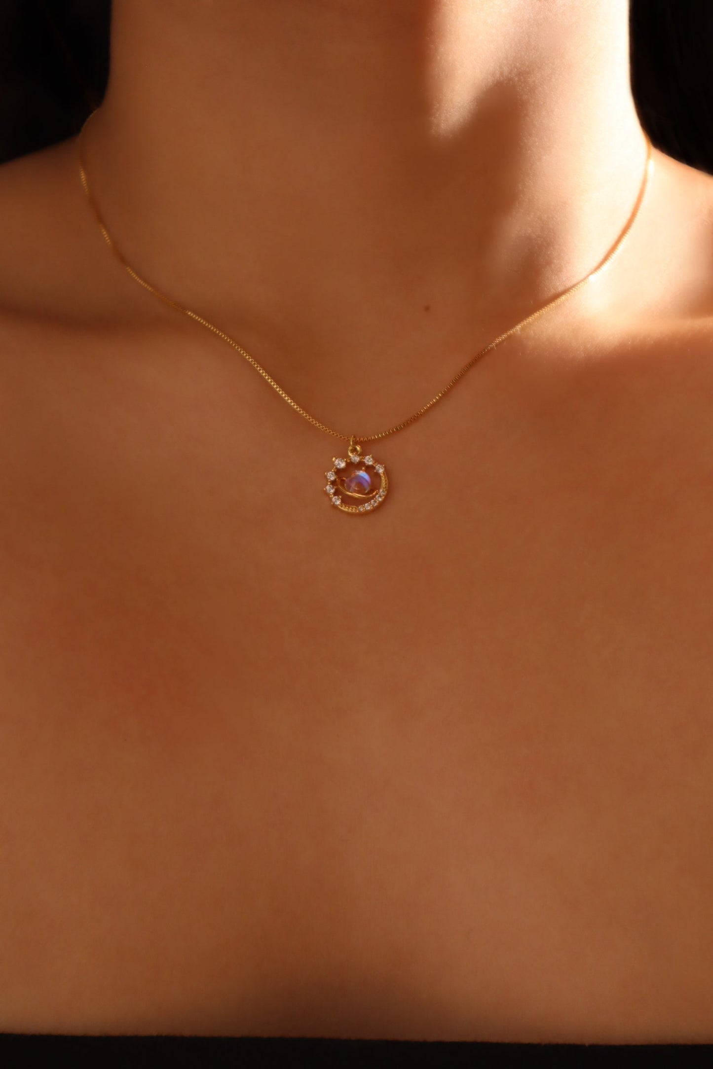 Ring met Saturnus en de Maan